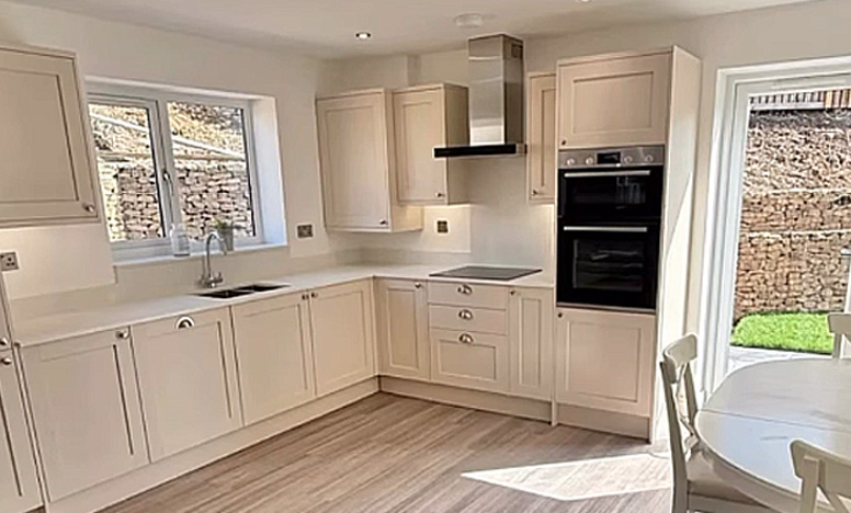 Bright fitted kitchen in a Gates Homes property